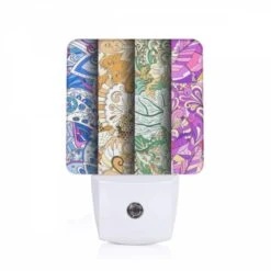Night Light, Three Colorful Designs Are Displayed On A Roll Of Paper.