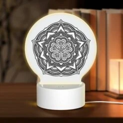 Round Acrylic Night Light, A Black And White Drawing Of A Flower.