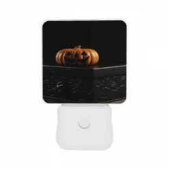 Night Light Set Of 2, A Carved Pumpkin Is Sitting On A Black Box. -Acrylic Night Light Shop 0ddc20eba4299c8121fd22aea3437e7660217b48