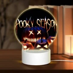 Round Acrylic Night Light, A Group Of Pumpkins With Scary Faces On Them.