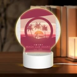 Round Acrylic Night Light, A Poster Of A Beach Resort With A Sunset In The Background.