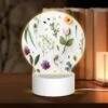 Round Acrylic Night Light, A Collection Of Flowers And Leaves On A White Background.
