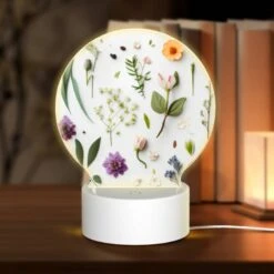 Round Acrylic Night Light, A Collection Of Flowers And Leaves On A White Background.