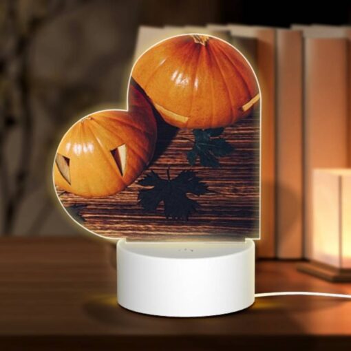 Love Acrylic Night Light, A Pumpkin With A Face Drawn On It Sits On A Table With Other Pumpkins. -Acrylic Night Light Shop 22f1eb594dd113120c63688362abe56ad5c1e15a