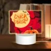Rectangular Acrylic Night Light, A Halloween Themed Poster With A Pumpkin And A Spider Web.