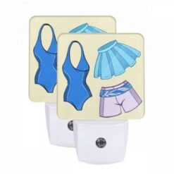 Night Light Set Of 2, A Blue And Purple Bathing Suit With A Blue Skirt And A Blue Top.