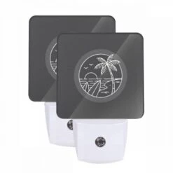 Night Light Set Of 2, A Black And White Image Of A Beach At Night With A Palm Tree And A Sunset.
