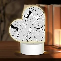 Love Acrylic Night Light, A Pattern Of White And Black Circles.