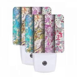 Night Light Set Of 2, Three Colorful Designs Are Displayed On A Row Of Paper.