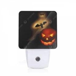 Night Light, A Pumpkin With A Bat And A Ghost Above It.