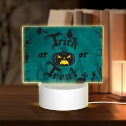 Rectangular Acrylic Night Light, A Halloween Poster With A Scary Pumpkin And A Skeleton.