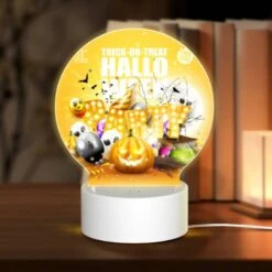 Round Acrylic Night Light, A Poster Advertising A Halloween Party.