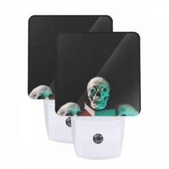 Night Light Set Of 2, A Stack Of Books With A Skull On Top.