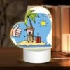 Love Acrylic Night Light, A Man In A Suit And Hat Is Standing On A Beach With A Suitcase And A Bag.