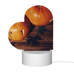 Love Acrylic Night Light, A Pumpkin With A Face Drawn On It Sits On A Table With Other Pumpkins. -Acrylic Night Light Shop 43a188bd765cf997ca3303f4666bd05574a60bf3