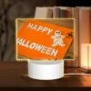 Rectangular Acrylic Night Light, A Happy Halloween Sign With A Gingerbread Man And A Spider.