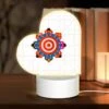 Love Acrylic Night Light, A Group Of People Are Standing Around A Circle With A Bullseye In The Middle.