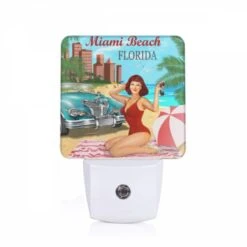 Night Light, A Woman In A Red Bathing Suit Sits On A Towel In Front Of A Vintage Car.