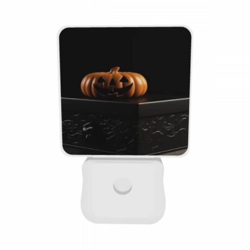 Night Light Set Of 2, A Carved Pumpkin Is Sitting On A Black Box. -Acrylic Night Light Shop 52d0ce05efc9ff297ef3122fe328640efabb4934
