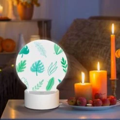 Round Acrylic Night Light, A Collection Of Green Leaves And Tree Branches. -Acrylic Night Light Shop 635e4fe75a95a94e0d97e52e65eb2d4a6fcf3a73
