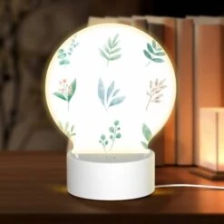 Round Acrylic Night Light, Six Different Types Of Plants Are Shown In A Row.
