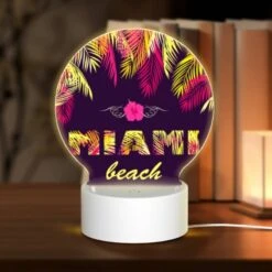 Round Acrylic Night Light, A Colorful Beach Scene With Palm Trees And The Word "Miami" Written In Yellow.