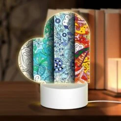 Love Acrylic Night Light, Three Colorful Designs Of Flowers Are Displayed On A Wall.