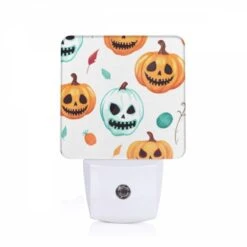 Night Light, A Pattern Of Pumpkins With Smiling Faces And Leaves.
