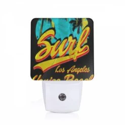 Night Light, A Surfboard Logo With The Words "Surf Los Angeles" Written On It.