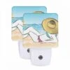 Night Light Set Of 2, A Woman Is Laying On The Beach