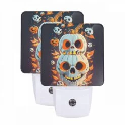 Night Light Set Of 2, A Colorful Pumpkin With A Skeleton Face And A Knife In Its Head.