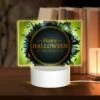 Rectangular Acrylic Night Light, A Round Sign With A Halloween Theme.