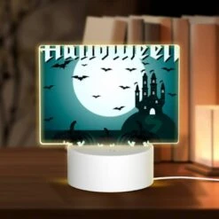 Rectangular Acrylic Night Light, Three Pumpkins With Faces Drawn On Them.