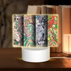 Rectangular Acrylic Night Light, Four Different Colored And Patterned Designs Of A Bird.