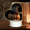 Love Acrylic Night Light, A Carved Pumpkin With A Top Hat On It.