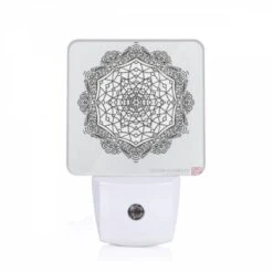 Night Light, A Black And White Drawing Of A Geometric Pattern.