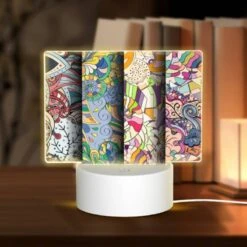 Rectangular Acrylic Night Light, Four Different Colored Paintings Of Flowers.