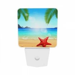 Night Light Set Of 2, A Red Starfish Is Sitting On The Beach In Front Of The Ocean. 6 Night Light Set Of 2, A Red Starfish Is Sitting On The Beach In Front Of The Ocean. -Acrylic Night Light Shop 91e655fef24ce982a0c2138c63e289c0d29a284c