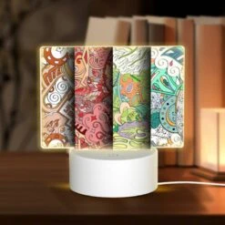 Rectangular Acrylic Night Light, Three Different Colored Paintings Of A Leaf.