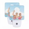 Night Light Set Of 2, A Family Of Three Is Enjoying A Day At The Beach.