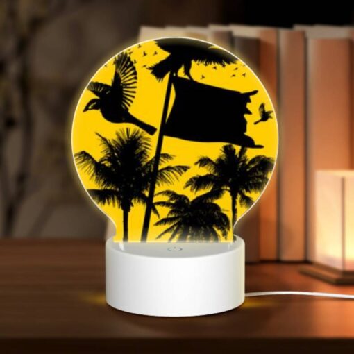 Round Acrylic Night Light, A Black And White Image Of A Bird Flying In Front Of A Yellow Flag. -Acrylic Night Light Shop 9f30aa6ca3dd0caec2b5611abc672a39a35b30f6