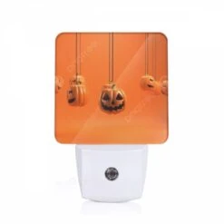 Night Light, A Row Of Orange Pumpkins With Faces On Them.