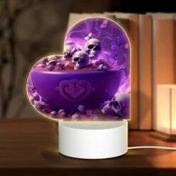 Love Acrylic Night Light, A Bowl Of Skulls And Bones Is Placed On A Table.
