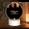 Round Acrylic Night Light, A Flyer For A Halloween Party.