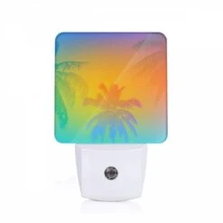 Night Light, A Colorful Sunset With Palm Trees In The Background.