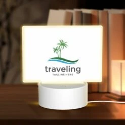 Rectangular Acrylic Night Light, A Logo For Traveling With A Palm Tree In The Background.