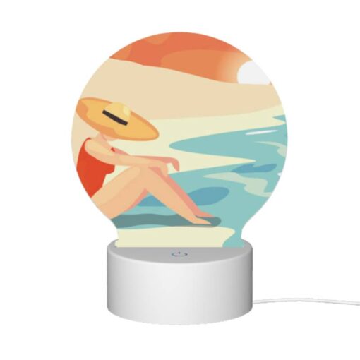 Round Acrylic Night Light, A Woman Wearing A Hat Sits On The Beach. -Acrylic Night Light Shop af5e37bdbe0bf2880e8ed706a2be0f04dd627aa4