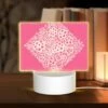 Rectangular Acrylic Night Light, A Pink Square With White Flowers On It.