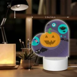 Love Acrylic Night Light, A Pumpkin Is Surrounded By Bats And Other Halloween-themed Items. 5 Love Acrylic Night Light, A Pumpkin Is Surrounded By Bats And Other Halloween-themed Items. -Acrylic Night Light Shop b29414047a19772072ef31598d85688d91317310
