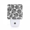 Night Light, A Pattern Of Black And White Leaves.